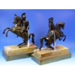 A PAIR OF 19th.CENTURY EQUESTRIAN BRONZES OF A COSSACK AND A ROMAN SOLDIER, THEIR HORSES REARING ON