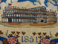 A BERLIN WOOL WORK PICTURE OF THE CRYSTAL PALACE WHEN HOME TO THE 1851 GREAT EXHIBITION. 51 x 51cms.