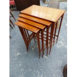 AN EDWARDIAN INLAID SATINWOOD NEST OF FOUR TABLES, TAPERED LEGS.