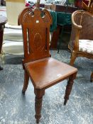 A LATE VICTORIAN CARVED OAK HALL CHAIR, TURNED FRONT LEGS.