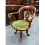 A LATE VICTORIAN MAHOGANY SWIVEL DESK CHAIR.