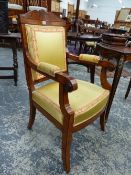 A PAIR OF BURR WALNUT AND INLAID FRENCH EMPIRE ARMCHAIRS WITH GOLD SILK UPHOLSTERY.