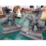 A PAIR OF SPELTER MARLEY HORSES AFTER COUSTOU, EACH REARING BESIDE THEIR HANDLERS. H 40cms.