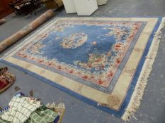 A CHINESE CARPET 372 x 277cms.