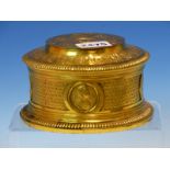 A 19th C. FRENCH GILT BRONZE BOX CAST WITH ROUNDELS OF 17th C. MALE AND FEMALE HEADS, THE CIRCULAR