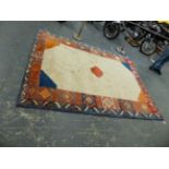 AN ORIENTAL TRIBAL CARPET. 284 x 212cms.