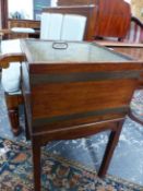 A 19th C. MAHOGANY PLANTER AND METAL LINER, THE SQUARE TOP ENCIRCLED BY TWO BRASS BANDS ABOVE A