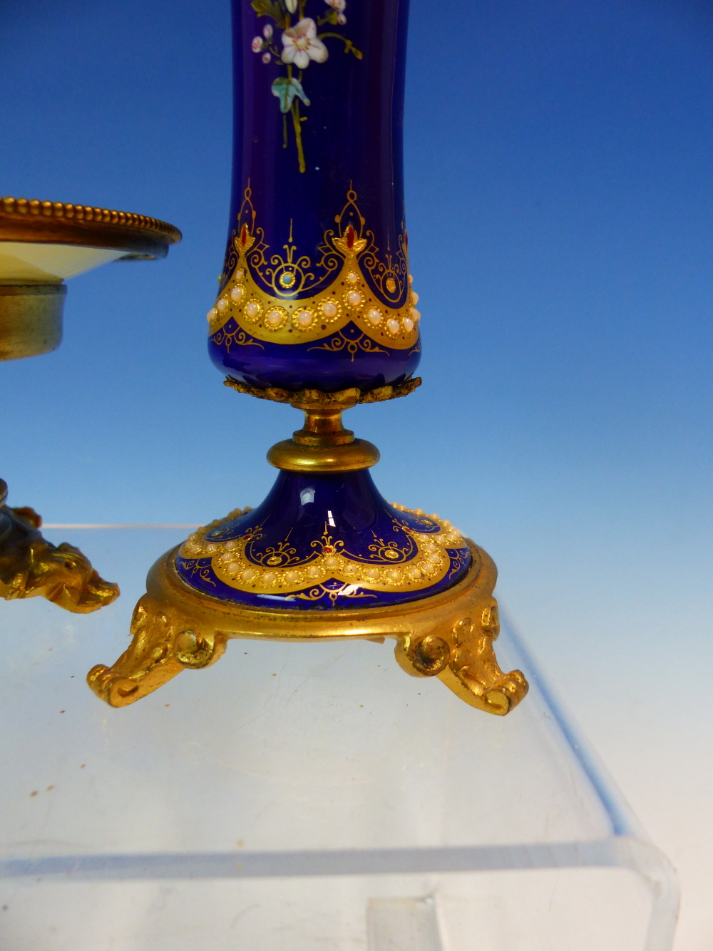 A FLORAL ENAMELLED ROYAL BLUE GROUND WAISTED CYLINDRICAL VASE ON FOUR ORMOLU FEET. H 15cms. ROGETHER - Image 5 of 14