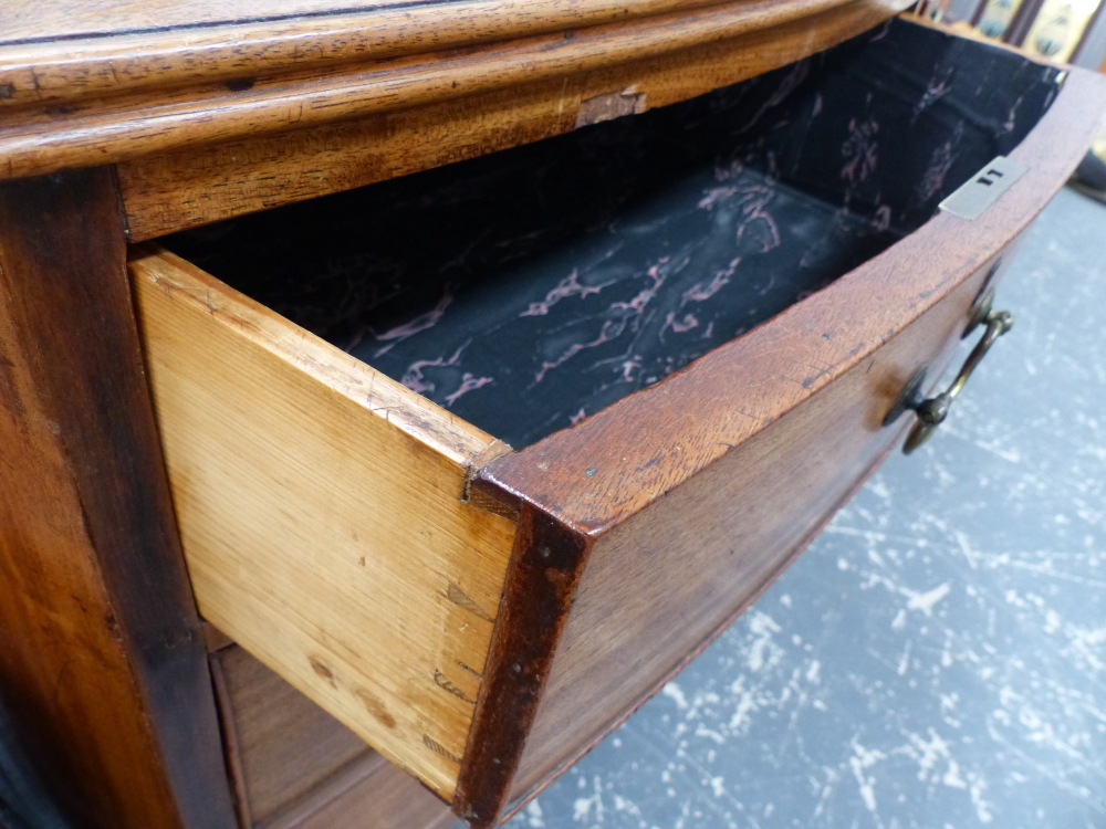 AN EARLY 19TH CENTURY MAHOGANY BOWFRONT FOUR DRAWER CHEST. - Image 13 of 13