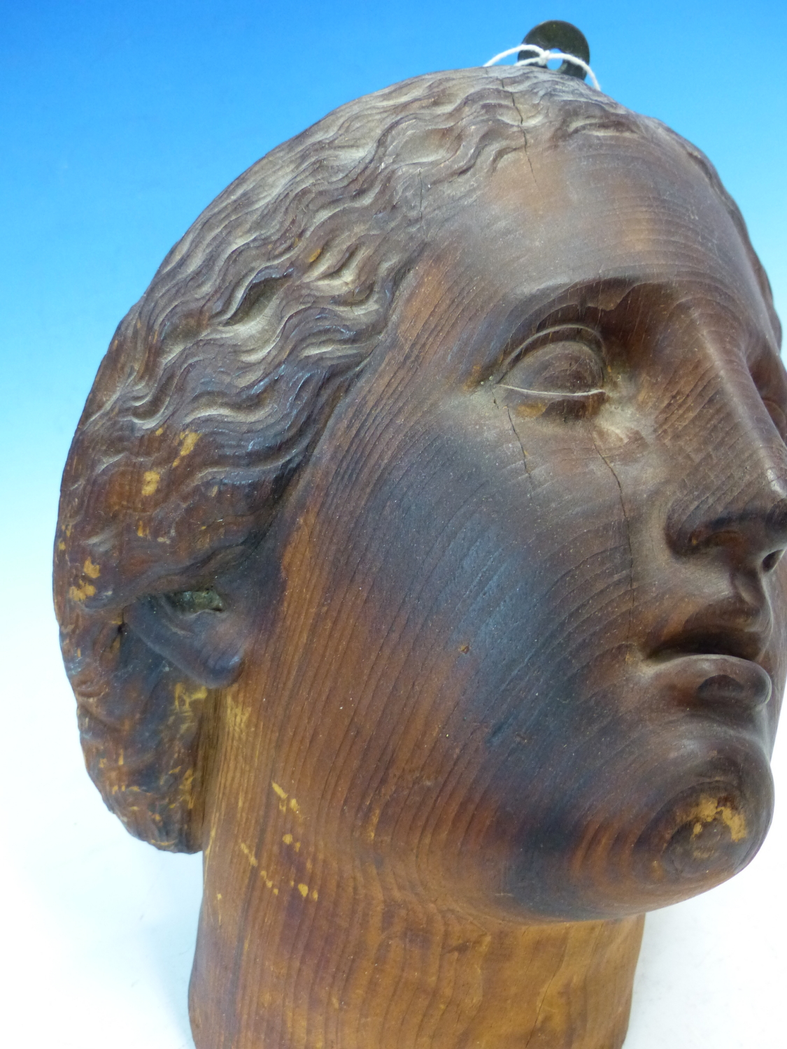 A CARVED PINE HEAD OF A FEMALE SAINT LOOKING HEAVENWARDS. H 26cms. - Image 3 of 6
