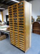 A GOOD LARGE MID CENTURY HABERDASHERY CABINET CONSISTING OF FIFTY FOUR DRAWERS WITH GLAZED FRONTS.