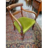 A GEORGE III OPEN GRAINED MAHOGANY ELBOW CHAIR, THE BROAD TOP RAIL OF A HORIZONTAL BAR SPLAT, THE