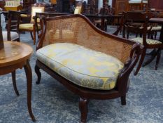 A BESPOKE MAHOGANY EMPIRE STYLE SHOW FRAME CANE BACK SMALL CHAISE LOUNGE. L.137cms.