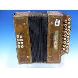 AN ANTIQUE CESARE PANGOTTI ACCORDION WITH BONE STOPS AND THE WOODEN ENDS INLAID WITH MULTI-
