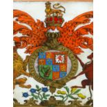 A REVERSE GLASS ROYAL ARMORIAL FOR GREAT BRITAIN WITHIN A PINE FRAME. 46.5 x 33.5cms.