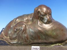 PAULINE BOUMPHREY. 1886-1959, BRONZE GROUP OF TWO SLEEPING SPANIEL PUPPIES ON RECTANGULAR POLISHED