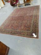 AN ANTIQUE PERSIAN KESHAN CARPET. 361 x 262cms.