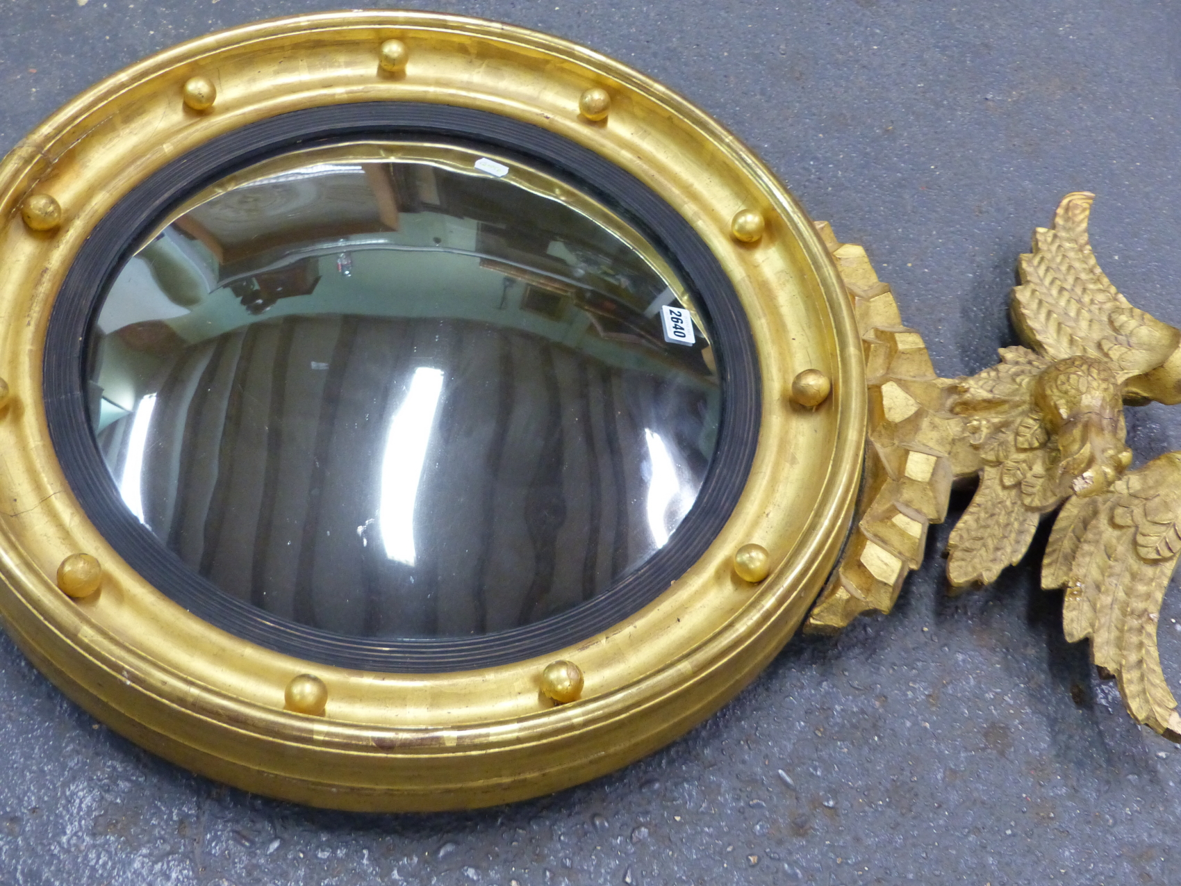 A CONVEX MIRROR WITHIN REEDED SLIP AND BEADED GILT FRAME SURMOUNTED BY AN EAGLE. H 90 x Dia. 63cms. - Image 10 of 13