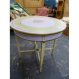 TWO SIMILAR CREAM PAINTED ROUND TABLES GILT OUTSIDE THE MAUVE BAND ON THE TOPS, THE TAPERING