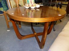 AN UNUSUAL METAL BANDED ROUND INLAID WALNUT LOW RETRO CENTRE TABLE. H. 61 x D. 90cms.