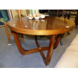 AN UNUSUAL METAL BANDED ROUND INLAID WALNUT LOW RETRO CENTRE TABLE. H. 61 x D. 90cms.