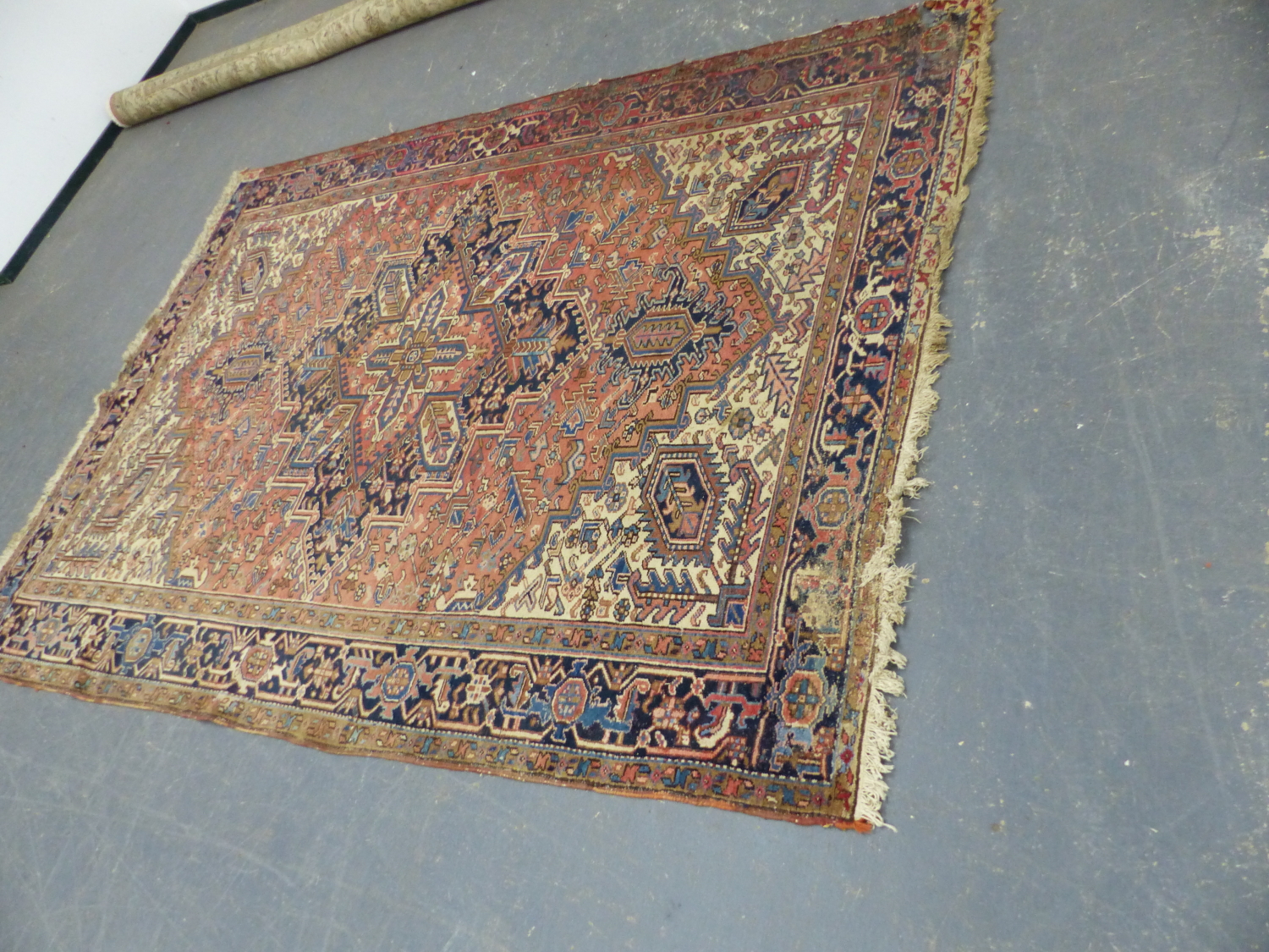 A PERSIAN HERIZ CARPET 338 x 234cms.