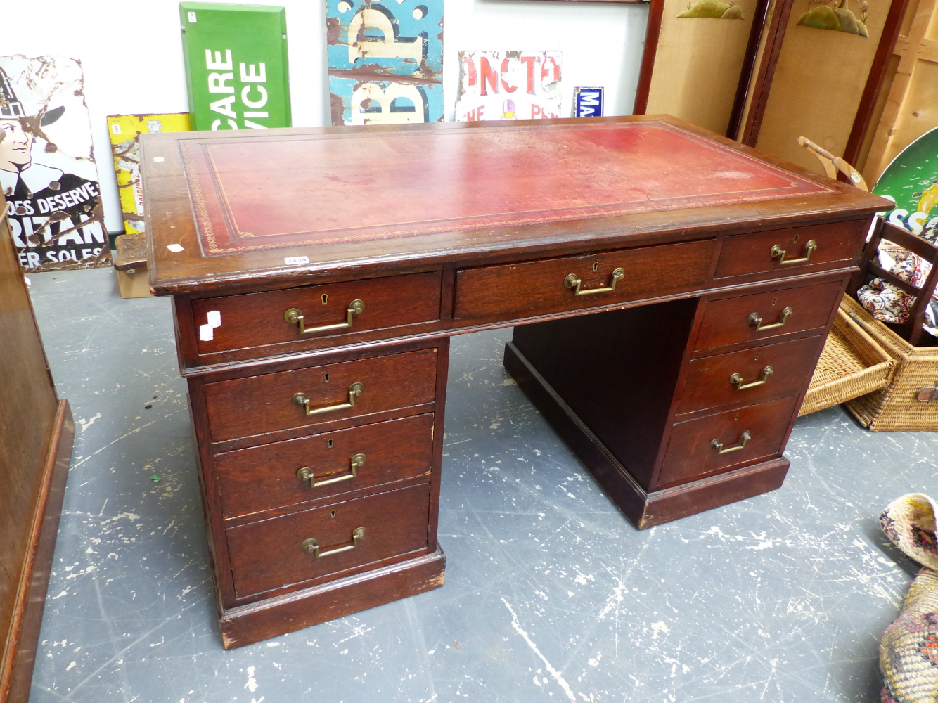 A VICTORIAN OAK TWIN PEDESTAL DESK WITH LEATHER INSET TOP. W.138 x D.75cms.