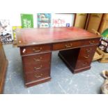 A VICTORIAN OAK TWIN PEDESTAL DESK WITH LEATHER INSET TOP. W.138 x D.75cms.