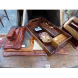 A LEATHER MOUNTED DESK SET, A WOODEN TRAY, TWO BOXES, A BLOTTER AND A MOTTLED BROWN STONE BOWL.