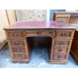 A GOOD MID VICTORIAN ROSEWOOD PEDESTAL DESK WITH ARRANGEMENT OF NINE DRAWERS AND DUMMY DRAWERS