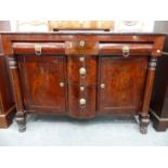AN EARLY 19th.C.MAHOGANY SIDEBOARD WITH ARRANGEMENT OF DRAWERS AND CABINETS FLANKED BY TURNED