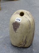 A LARGE TRIBAL STONE WEIGHT WITH PIERCED TOP. H.23cms