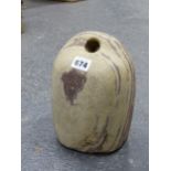 A LARGE TRIBAL STONE WEIGHT WITH PIERCED TOP. H.23cms