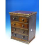 A MINIATURE MAHOGANY AND PINE CHEST OF FIVE DRAWERS. H. 38 x W. 31cms.