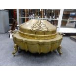 A PERSIAN HEAVY CAST AND PIERCED BRASS BRAZIER WITH DOME COVER, OVAL LOBED FORM WITH SCROLL FEET. H.