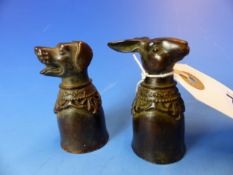 TWO UNUSUAL BRONZE CANDLE SNUFFERS WITH ANIMAL HEAD FINIALS, A HARE AND A HOUND. H. 6cms (2).