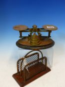 AN EDWARDIAN SET OF BRASS POSTAGE SCALES WITH WEIGHTS, TOGETHER WITH A LETTER RACK OF THE SAME