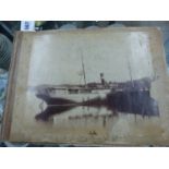 AN INTERESTING VINTAGE PHOTOGRAPH ALBUM CONTAINING IMAGES OF A COASTAL VOYAGE, TOGETHER WITH VARIOUS