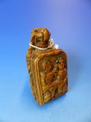 A CARVED WOOD SNUFF BOX, THE HINGED LID BACKED BY A LION. THE LID ITSELF CARVED IN RELIEF WITH A