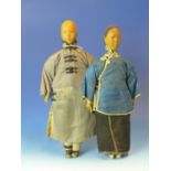 A RARE PAIR OF VINTAGE CHINESE DOOR OF HOPE MISSION CARVED DOLLS, A MAN AND WOMAN IN TRADITIONAL