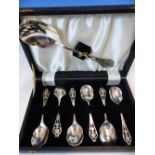 A CASED SET OF HALLMARKED SILVER DESSERT SPOONS AND SERVER.
