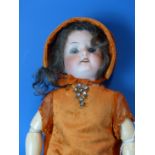 A VINTAGE BISQUE HEAD GERMAN DOLL BY ERNEST HEUBACH. MOULD NO. 250? H.36cms.
