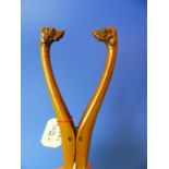 TREEN, A FINELY CARVED 19th.C. BOXWOOD GLOVE STRETCHER WITH DOG HEAD HANDLES TOGETHER WITH A CARVED