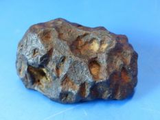 A LARGE HEAVY FRAGMENT METEORITE FROM THE YUKON.9CM LONG