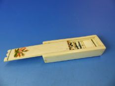 AN ANTIQUE MARINE IVORY DOMINOES SET WITHIN SLIDING TOP BOX 12 CM LONG