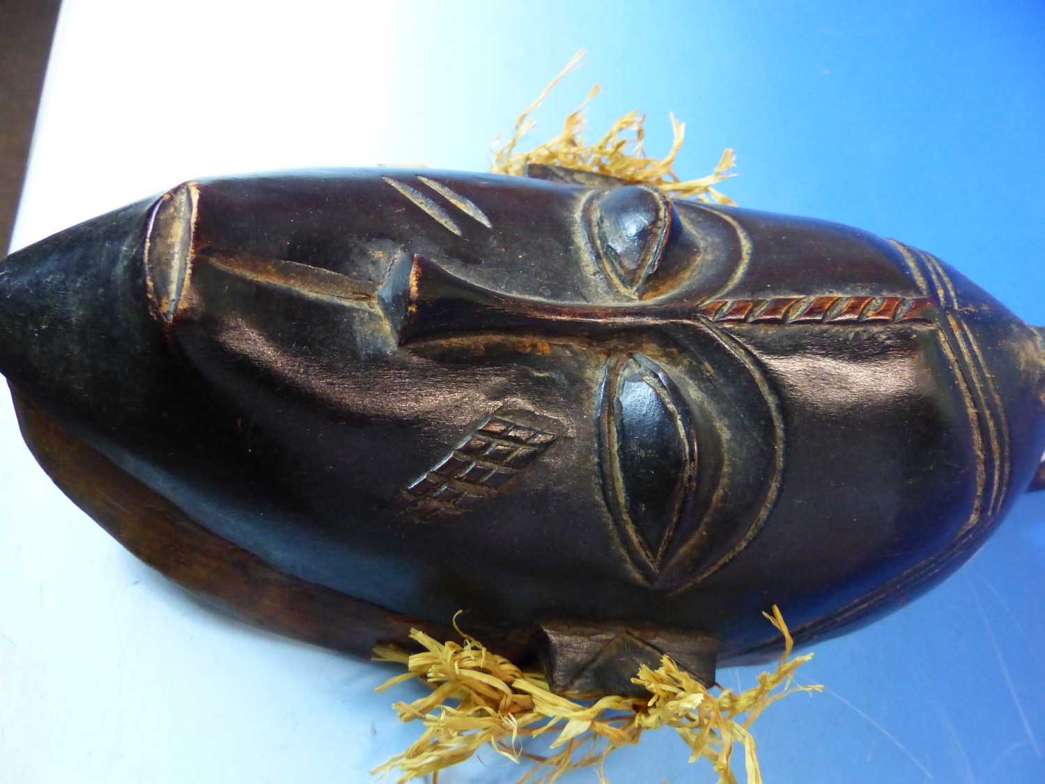 TWO CARVED AND DECORATED DECORATIVE AFRICAN TRIBAL MASKS. HEIGHT OF LARGEST 53cms. - Image 9 of 15