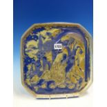 A 1982 BJORN WIINBLAD FOR ROSENTHAL REVERSE GILT ON A BLUE GROUND MOULDED GLASS DISH DER VERLOREN