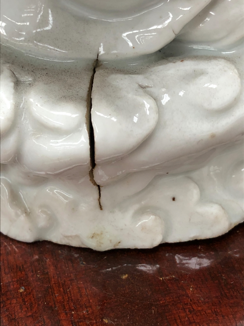 A BLANC DE CHINE FIGURE OF A FIERCE EYED MANDARIN STANDING ON A DOUBLE CLOUD PLINTH, HIS CHIN - Image 37 of 48