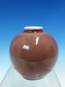 A CHINESE PEACH BLOOM SPHERICAL VASE, THE GLAZE OF AN EVEN COLOUR BELOW THE WHITE RIM, SIX CHARACTER