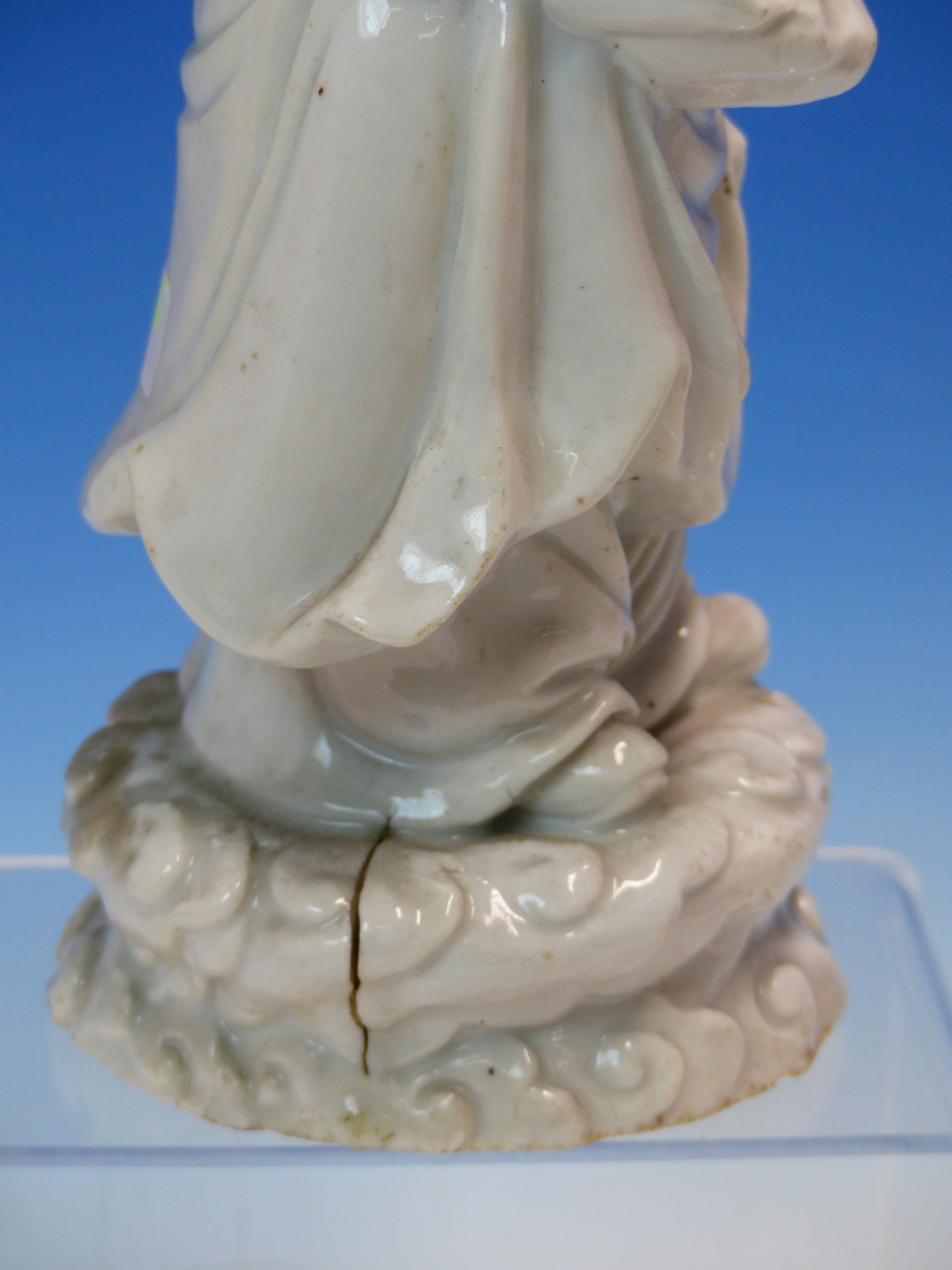 A BLANC DE CHINE FIGURE OF A FIERCE EYED MANDARIN STANDING ON A DOUBLE CLOUD PLINTH, HIS CHIN - Image 6 of 48